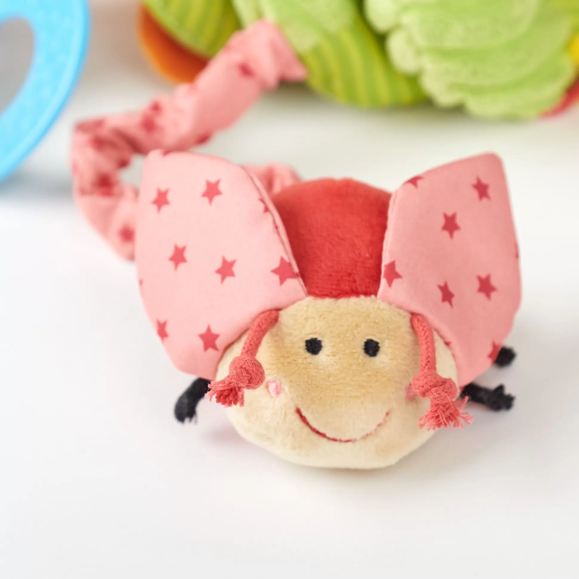 Bebe Sigikid Babyschalenspielzeug Schmetterling